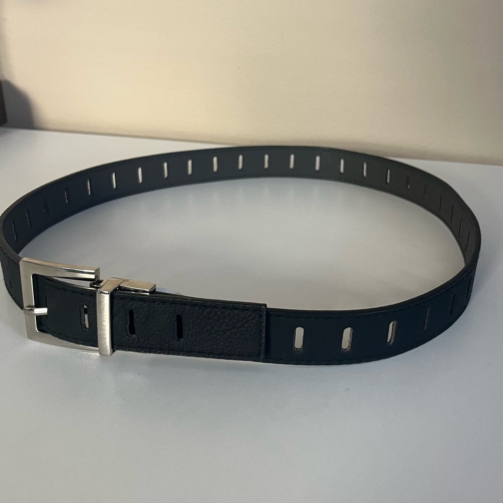 Black leather Adrienne Vittadini belt with silver buckle, size S/M